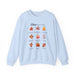 Sweatshirt bleu clair orné de neuf feuilles d'automne et de textes bibliques en français.