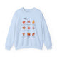 Sweatshirt bleu clair orné de neuf feuilles d'automne et de textes bibliques en français.