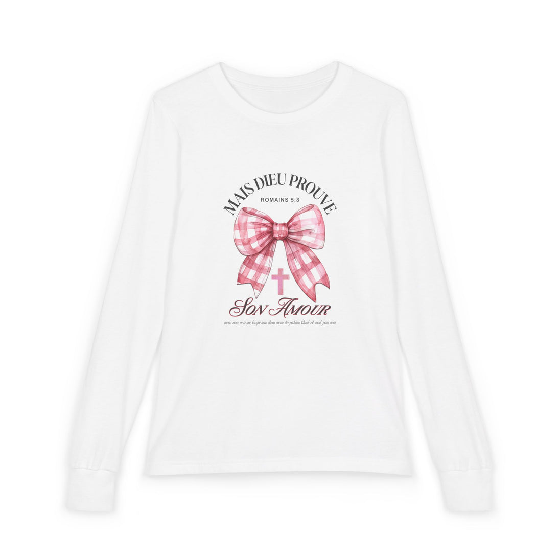 T-shirt blanc manches longues enfant avec nœud rose et texte biblique Mais Dieu prouve son amour.