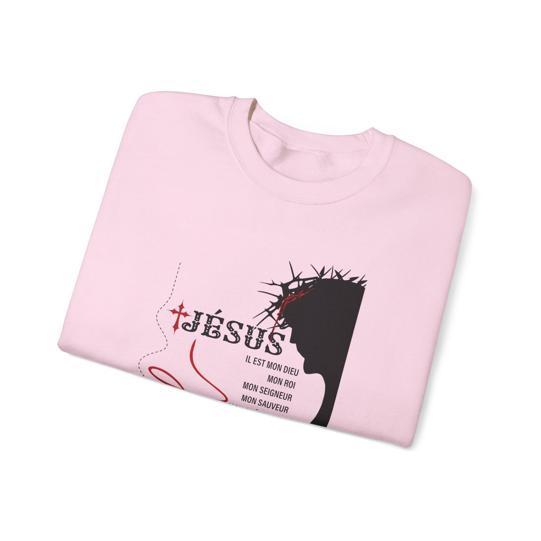 Sweat-shirt rose plié avec une illustration de Jésus portant une couronne d'épines.
