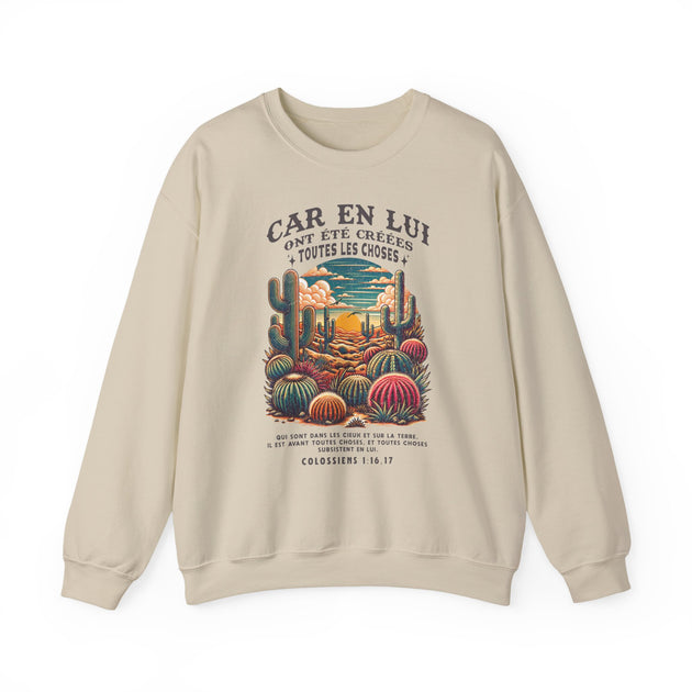 Sweatshirt beige à col rond avec une illustration de cactus et un texte biblique en français.