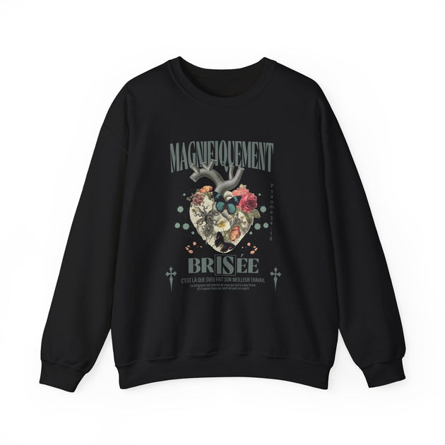 Sweat-shirt noir à col rond avec une illustration de cœur floral et des inscriptions en français.