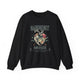 Sweat-shirt noir à col rond avec une illustration de cœur floral et des inscriptions en français.