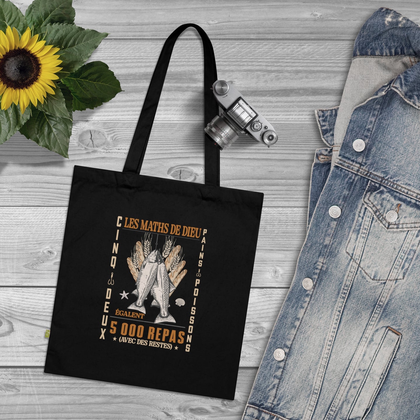 Tote bag noir en coton biologique orné d'une illustration religieuse sur le thème des pains.