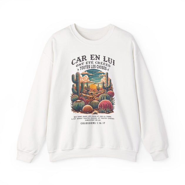 Sweat-shirt blanc à col rond avec une illustration de cactus et un texte biblique en français.