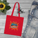 Tote bag rouge en coton biologique avec l'inscription Jésus est mon superhéros style comics.