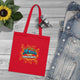 Tote bag rouge en coton biologique avec l'inscription Jésus est mon superhéros style comics.
