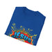 T-shirt bleu plié avec une illustration style bande dessinée représentant Jésus et une couronne.