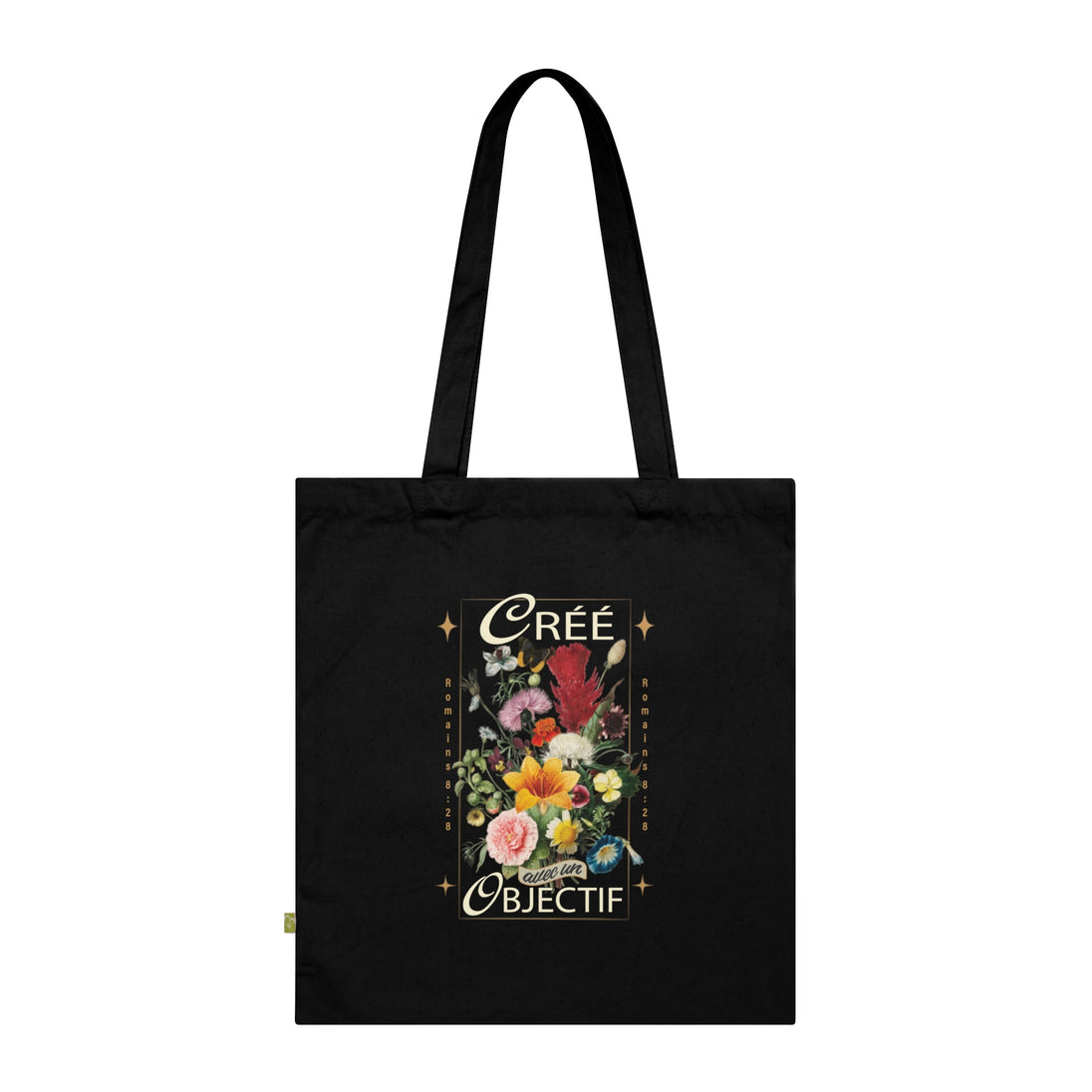 Tote bag noir en coton biologique orné d'un bouquet de fleurs et de l'inscription Créé avec un objectif.