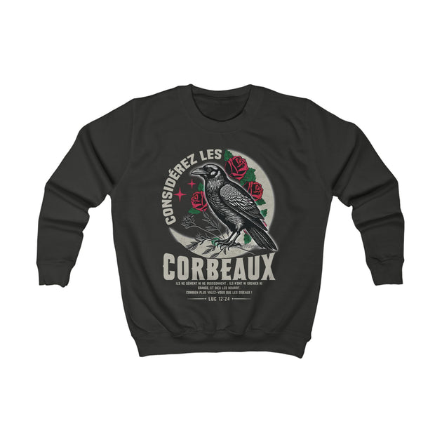 Sweatshirt noir pour enfant avec une illustration de corbeau, de roses et un texte biblique.