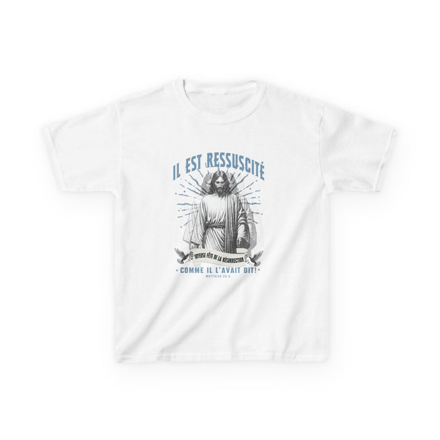 T-shirt blanc pour enfant avec une illustration de Jésus et le texte Il est ressuscité.
