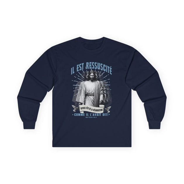 T-shirt bleu marine à manches longues avec une illustration religieuse et le texte Il est ressuscité.