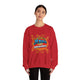 Une femme porte un sweatshirt rouge avec l'inscription Jésus est mon superhéros en style comics.