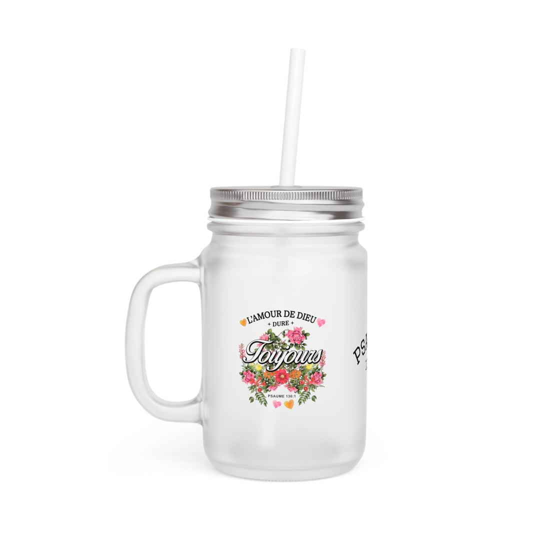 Un bocal en verre dépoli avec couvercle, paille et un motif floral inspirant.