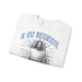 Sweatshirt blanc plié avec l'inscription Il est ressuscité et une illustration de Jésus.