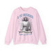 Sweat-shirt rose pâle pour homme avec une illustration religieuse et le texte Il est ressuscité.