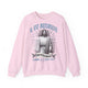 Sweat-shirt rose pâle pour homme avec une illustration religieuse et le texte Il est ressuscité.