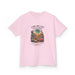T-shirt rose pour enfant avec une illustration de désert et un texte biblique en français.