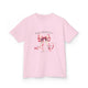 T-shirt rose pour enfant orné d'un ruban aquarelle et du verset biblique Jacques 1:17.