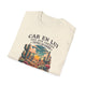 T-shirt beige plié avec une illustration de désert et le texte Car en lui ont été créées toutes les choses.