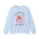 Sweat-shirt bleu clair avec un nœud rose à carreaux et le texte religieux Mais Dieu Prouve Son Amour.