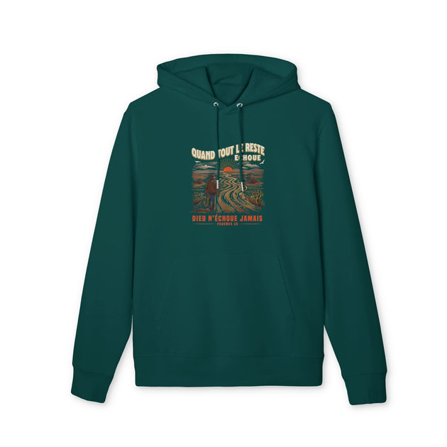 Sweat-shirt à capuche vert foncé avec une illustration de paysage et un texte religieux.