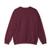 Sweat-shirt pour femme de couleur bordeaux, présenté de dos sur un fond blanc.