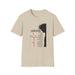 T-shirt beige pour femme avec une illustration de Jésus et une liste de ses attributs en français.