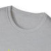 T-shirt gris à col rond avec le texte Jesus est mon Superhéros en typographie style bande dessinée.