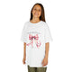 T-shirt blanc enfant avec nœud aquarelle rose et texte biblique Jacques 1:17.