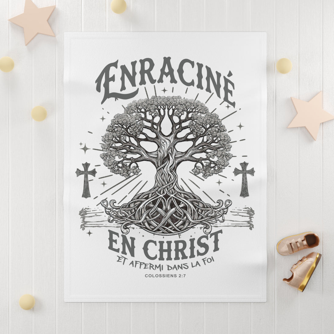 Couverture bébé blanche illustrée d'un arbre de vie et du texte chrétien Enraciné en Christ.