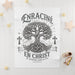 Couverture bébé blanche illustrée d'un arbre de vie et du texte chrétien Enraciné en Christ.