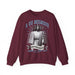 Sweat-shirt bordeaux pour homme avec une illustration religieuse et le texte Il est ressuscité.
