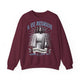 Sweat-shirt bordeaux pour homme avec une illustration religieuse et le texte Il est ressuscité.