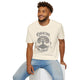 Un homme porte un t-shirt beige chiné avec une illustration d'arbre et le texte Enraciné en Christ.