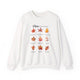 Sweatshirt blanc à col rond orné d'un motif de feuilles d'automne et de textes bibliques.